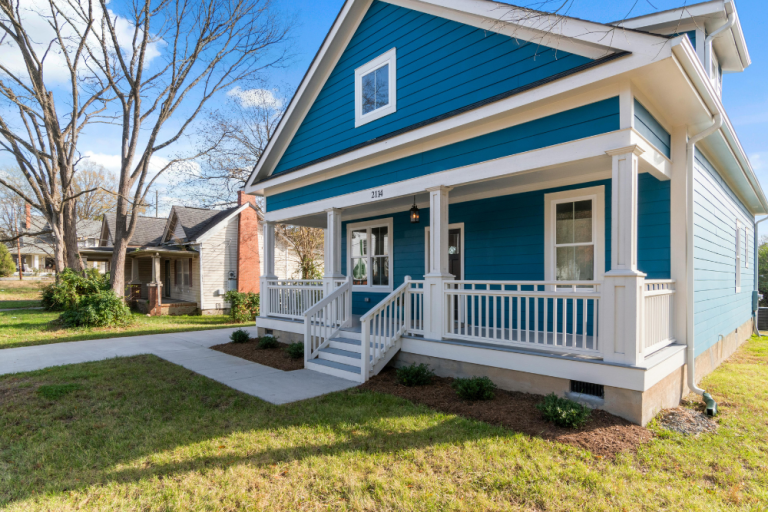 blue house in Missouri radon mitigation concept